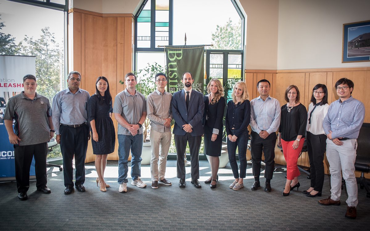 Fourteen new faculty members join the UConn School of Business for the Fall 2016 semester. (Nathan Oldham/UConn School of Business)