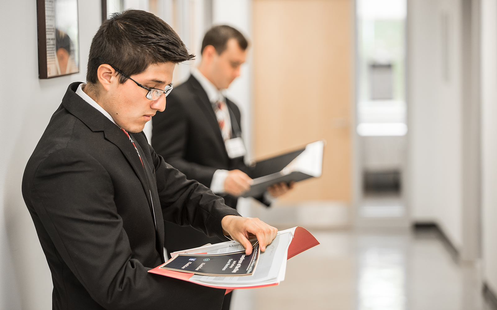 Students prepare to meet with employers at the Undergraduate Business Career Expo. (Nathan Oldham/UConn School of Business)