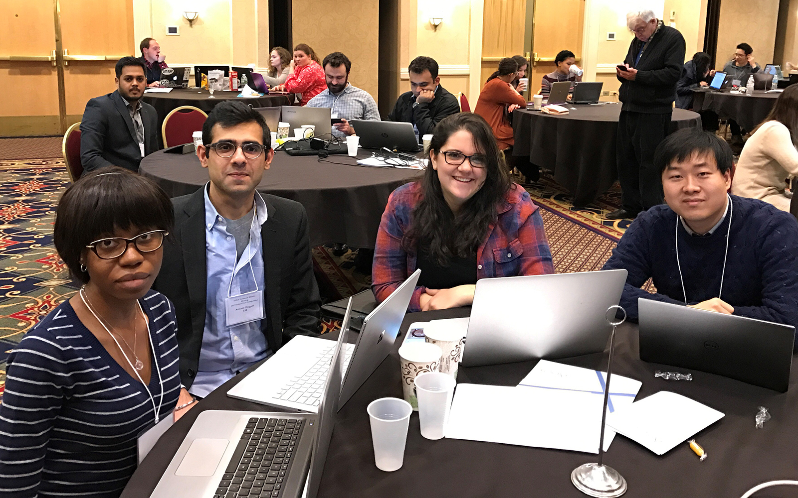 Enuma Ezeife, Avinash Chugani, Alexandra Buchanan and Ted Jin made up the team of UConn graduate studetns who won the APICS Northeast Student Competition (Ryan Baldassario/UConn School of Business)
