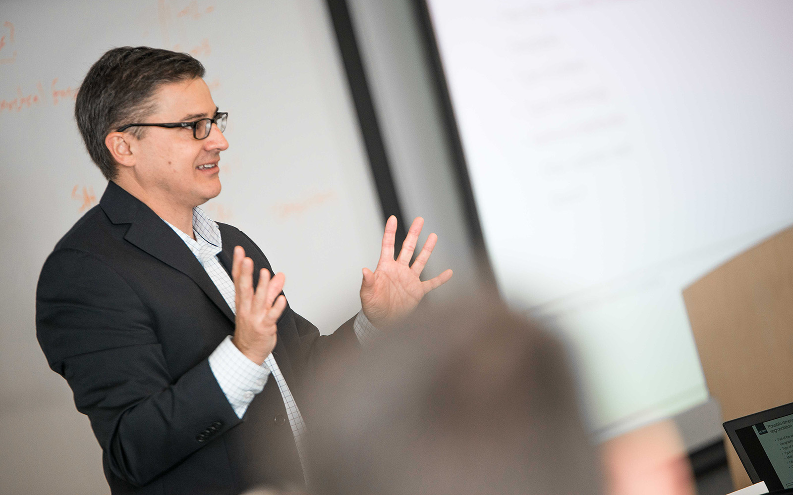 Professor Greg Reilly, teaching an Executive MBA course in Hartford, Conn. (Nathan Oldham/UConn School of Business)