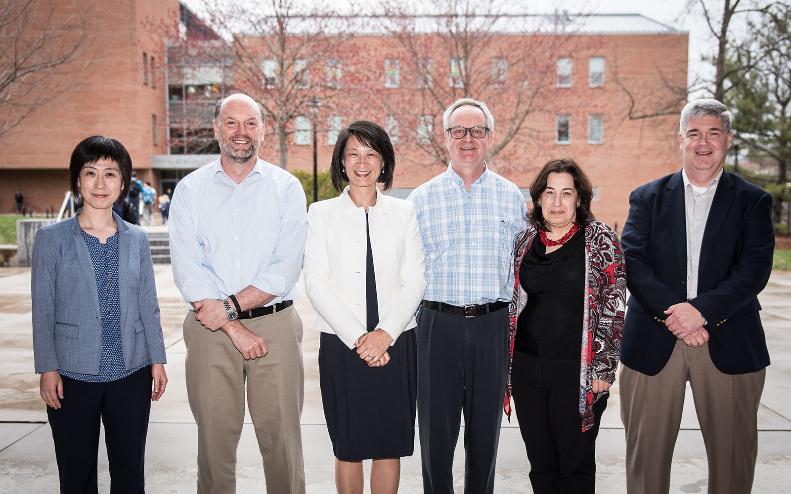 From left: Faculty award winners Xinxin Li, John Mathieu, Sulin Ba, Jan Stallaert, Nora Madjar, and David Papandria. (Nathan Oldham/UConn School of Business)