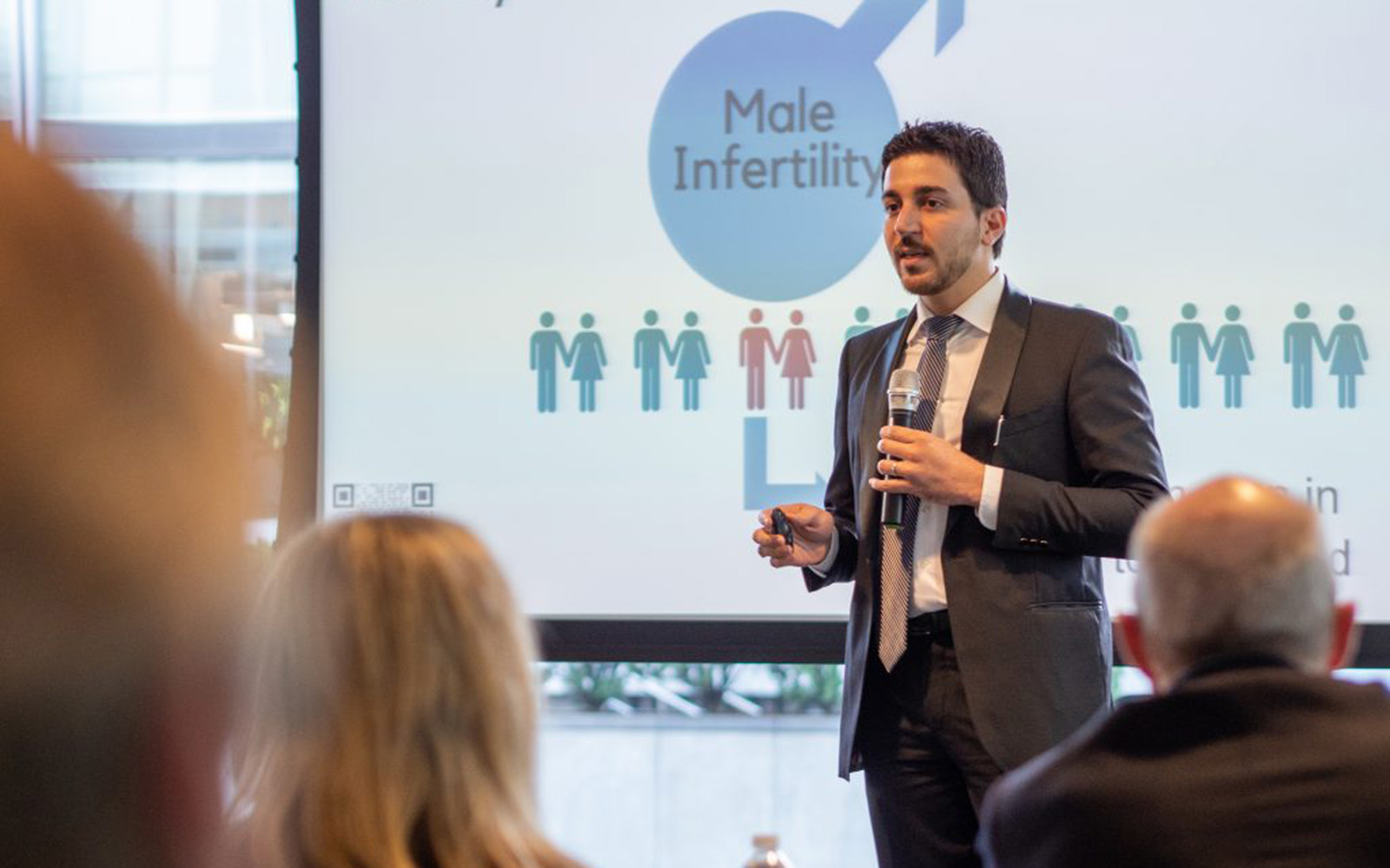 Engineering doctoral student Reza Amin presents the QRFertile concept to a panel of judges during the Wolff New Venture Competition.
