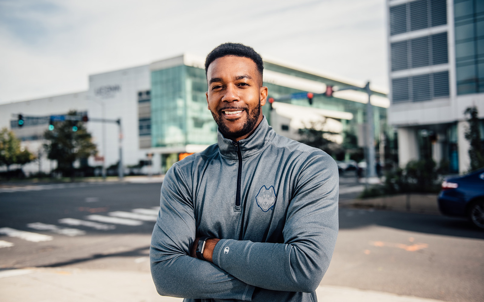 Junau Boucard '11 (above) will run in the NYC Marathon next month. He is juggling work, race training, and the Part-time MBA program at UConn Stamford. (Nathan Oldham/UConn School of business)