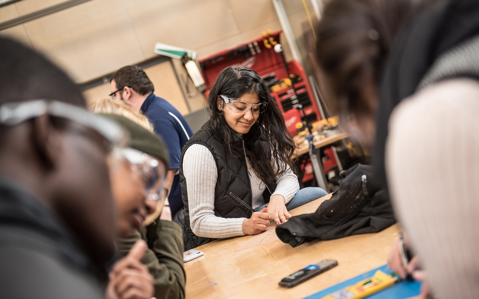 Students from eight universities, two of them international, participated in an ice-breaker at the Makerspace experimental lab at the Werth Tower, as a prelude to the Annual UConn CIBER Case Challenge. (Nathan Oldham/UConn School of Business)