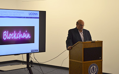 Jeff Marinstein explains Blockchain at a free UConn CITI workshop geared toward corporate executives. (Deborah Gunzelman/UConn CITI)