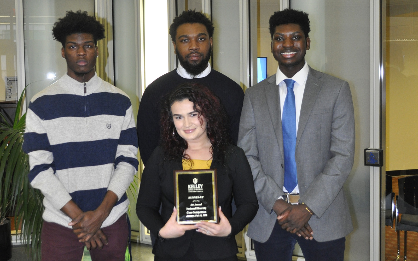 UConn students impressed the judges in a National Diversity Case Competition in Indiana recently, where they gave personalized pitches describing the need for a grocery store in Hartford. Pictured from left (back row) are: Aaron Hooker, Nick Furlow, Sean Brown, and (front row) Belma Pehratovic. All are Hartford natives and all are business majors except Hooker, who is studying political science. (UConn School of Business)