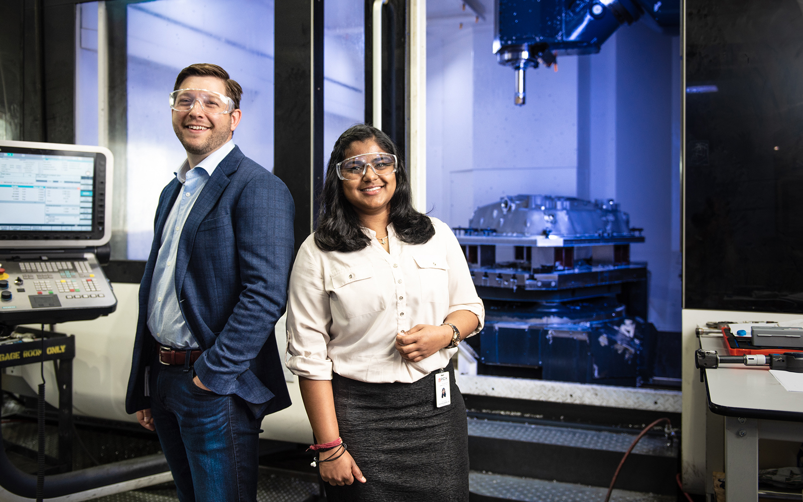 MBA student Don Pendagast (left) and MSBAPM student Chitra Reddy (right), were on a six person team dedicated to helping PCX Aerospace improve their critical data-collection systems. (Nathan Oldham / UConn School of Business)