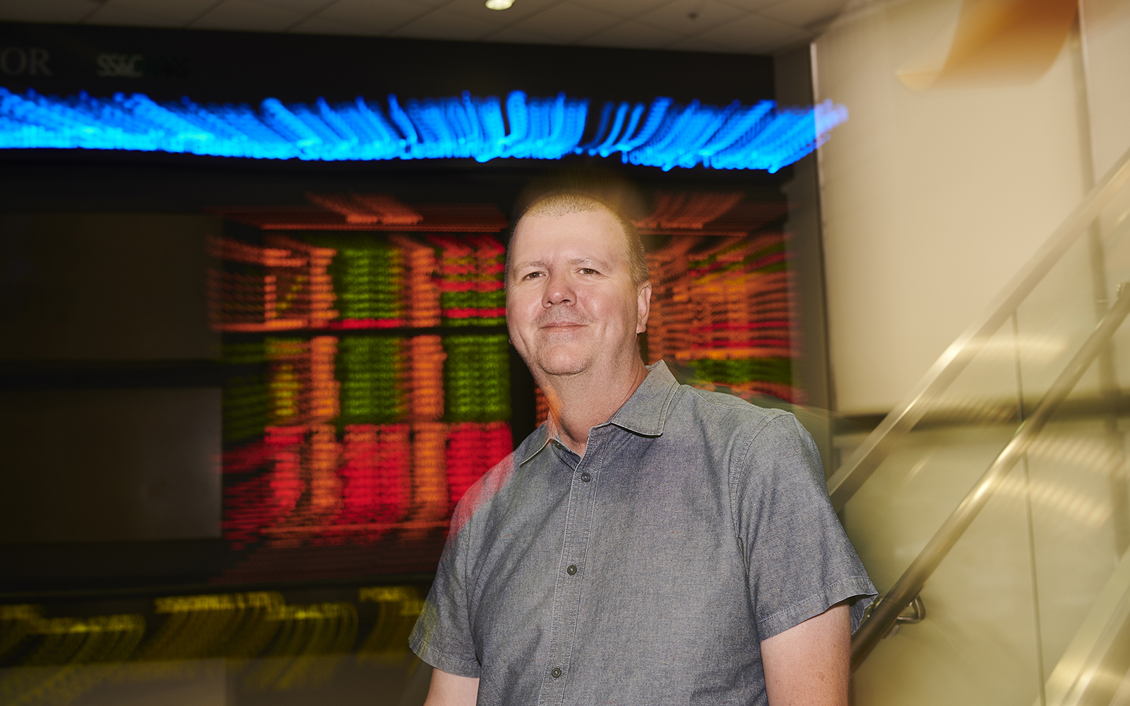 Paul Gilson, director and assistant professor of in residence of finance at the Graduate Business Learning Center in Hartford on Aug. 13, 2019. (Peter Morenus/UConn Photo)