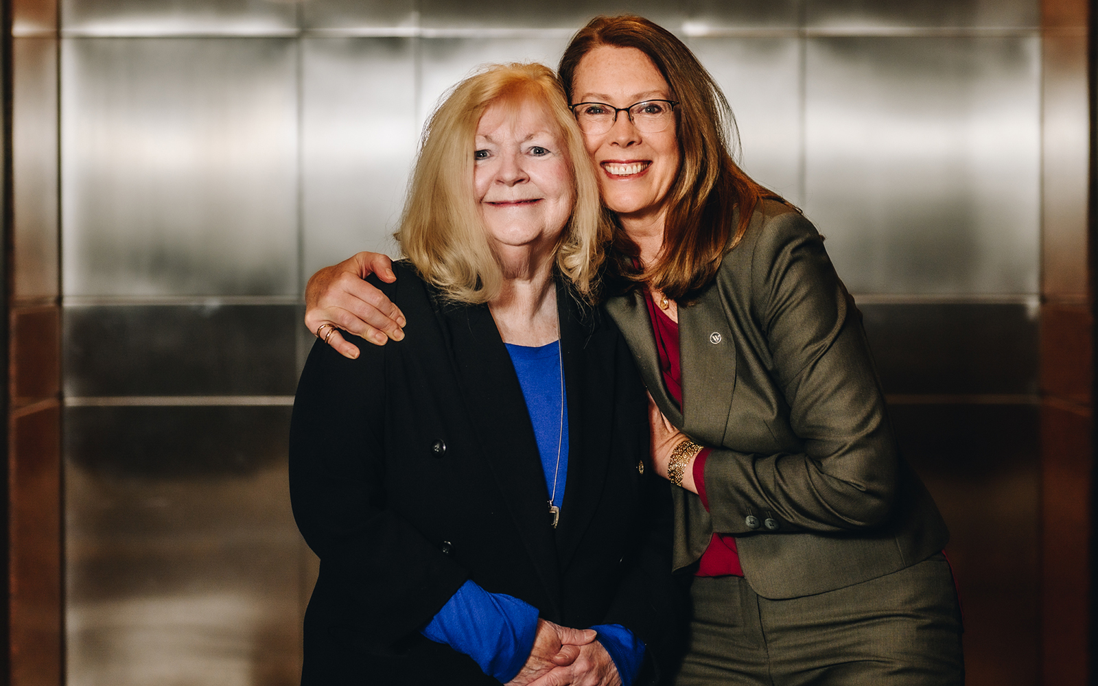 Tracie Borden (left), director  of administration & external affairs at UConn Waterbury, poses with Luria (right). (Nathan Oldham / UConn School of Business)