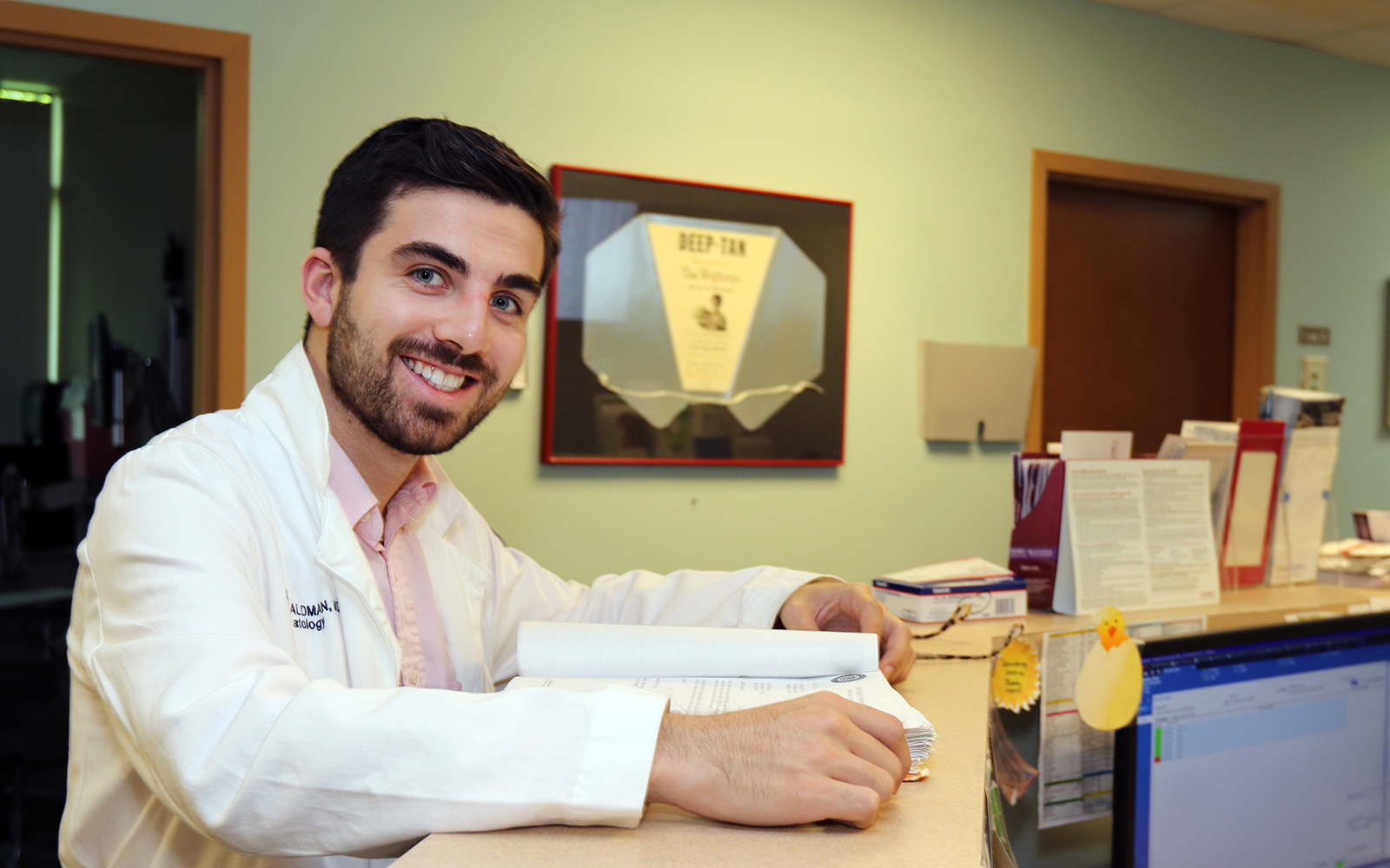 Reid Waldman MD is a resident in the dermatology practice at UConn Health on June 19, 2018. (Stan Godlewski for UConn Health)