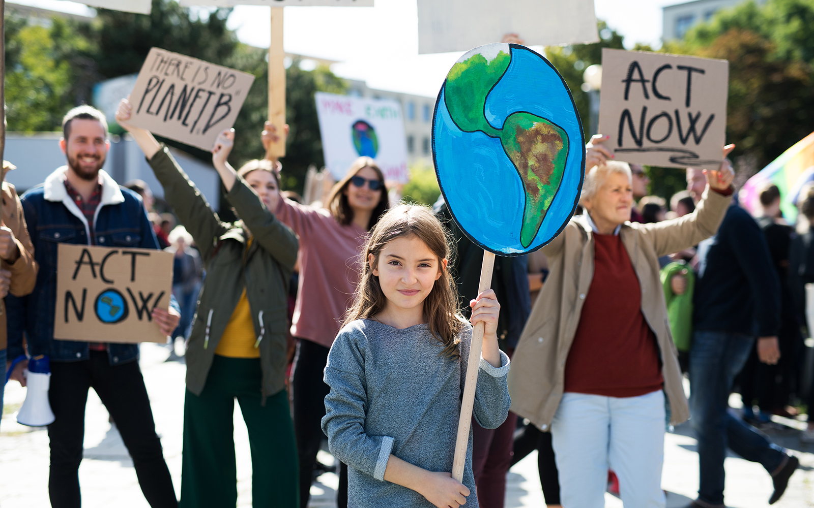 People with placards and posters on global strike for climate change.