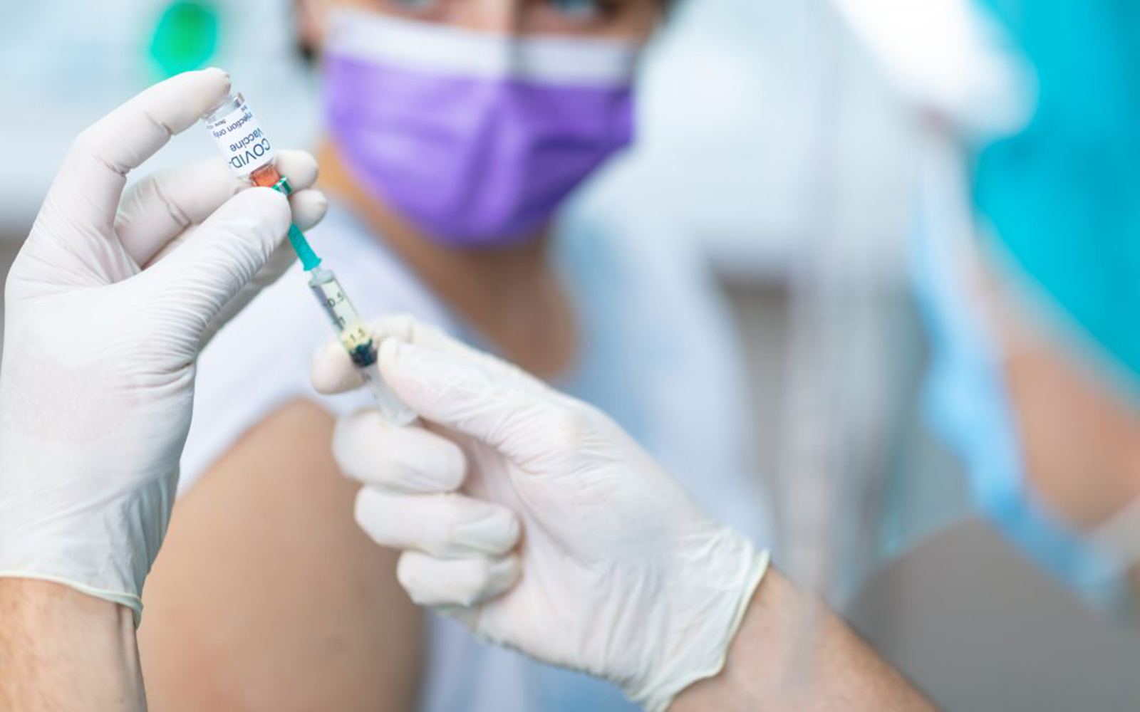 Getting COVID-19 vaccines from distribution centers into people's arms is a challenge that can be addressed by supply chain management practices. (Getty Images)