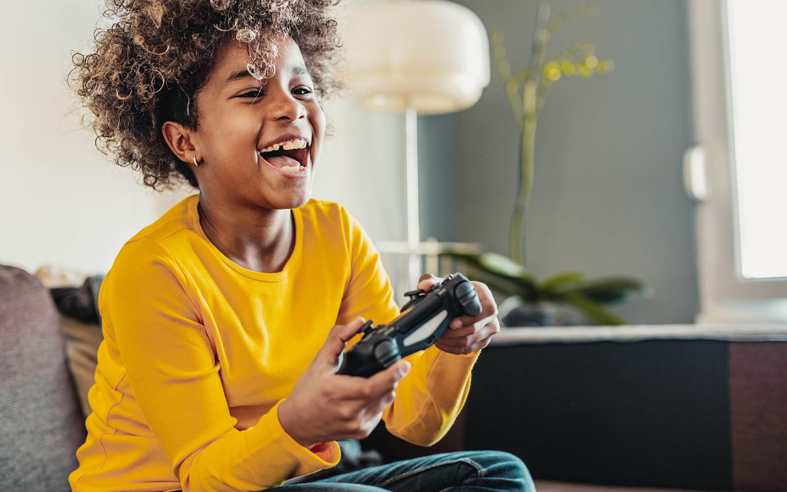 Young girl playing video games