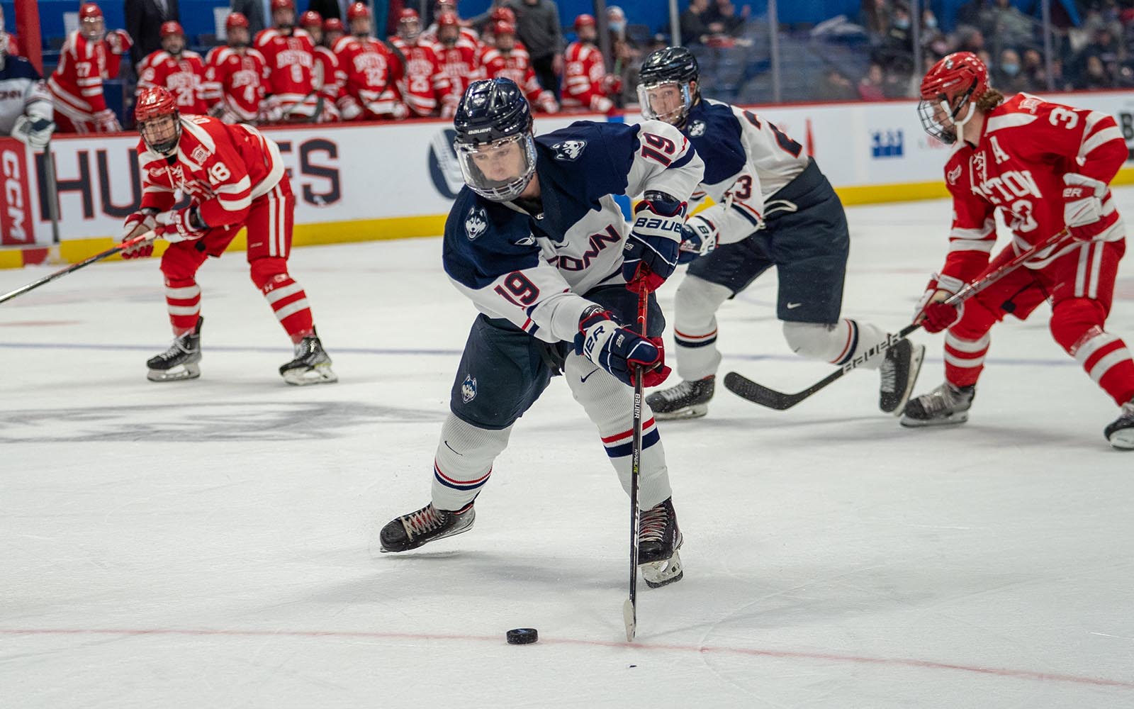 Kevin O'Neil, #19 on the Men's Hockey team, during a recent game with BU. (Photo Courtesy UConn Atlhetics)