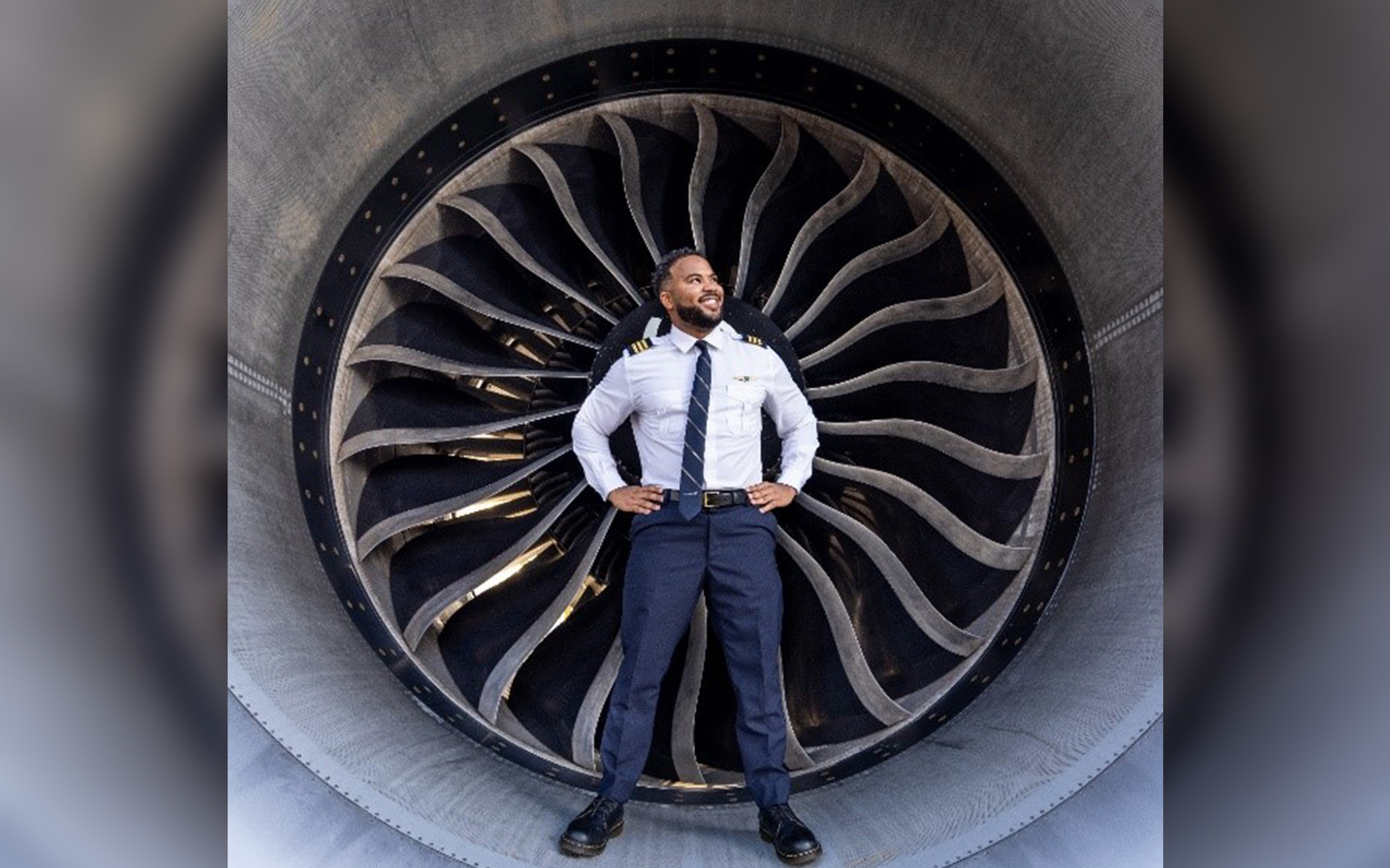 Atlas Air First Officer David Thompson stands before one of the company’s aircraft. Atlas Air recently partnered with UConn’s BAPM graduate program to analyze data for a pilot-retention program, and a second project on spare-part availability. 