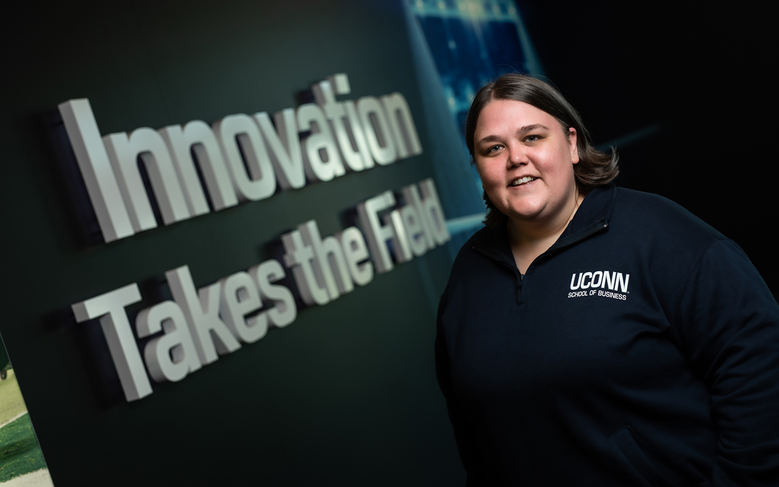 Jenny Gaffney '17 MBA poses at ESPN HQ in Bristol, CT. (Nathan Oldham / UConn School of Business)