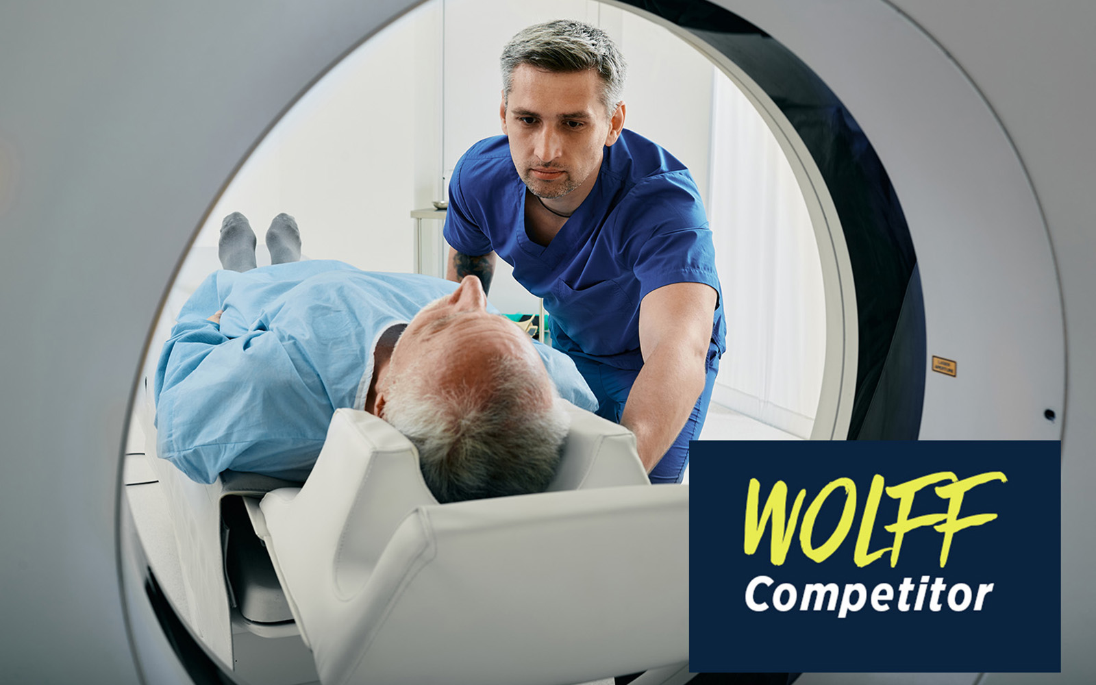 A patient is being slowly moved into an MRI machine.